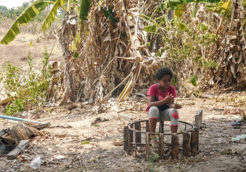 Girl eating mango(1)