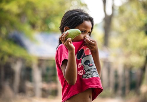 Girl eating mango(2)