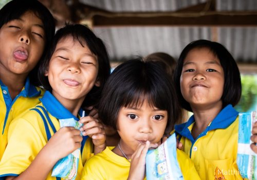 Group photo of students during milk time