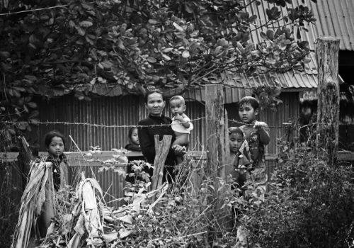 Local family outside their house