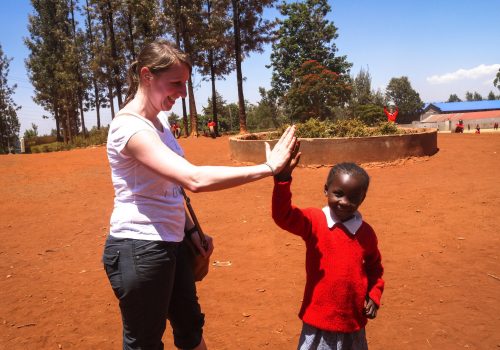 _Participant high fiving a student