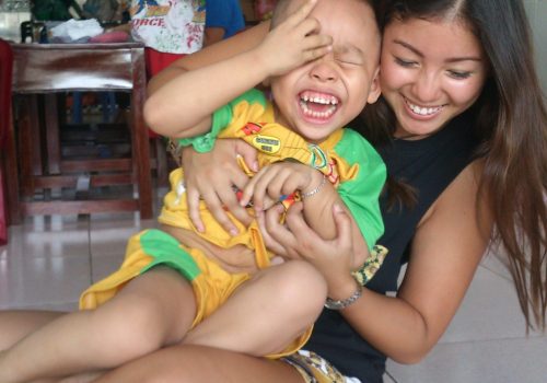 Participant playing with a child (2)