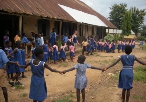 Participant playing with students