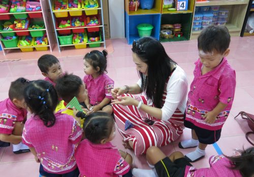 Participant talking with kids