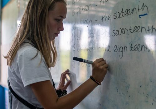 Participant writing on the whiteboard