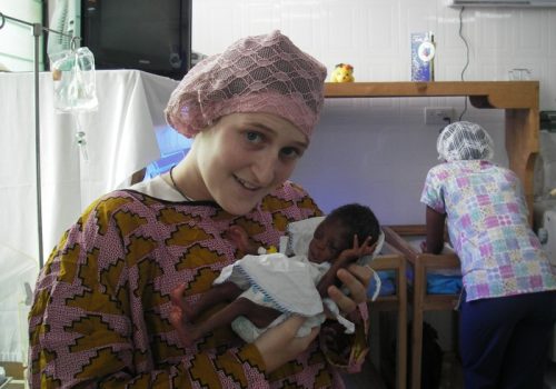 _Participant_holding_a_newborn.jpg