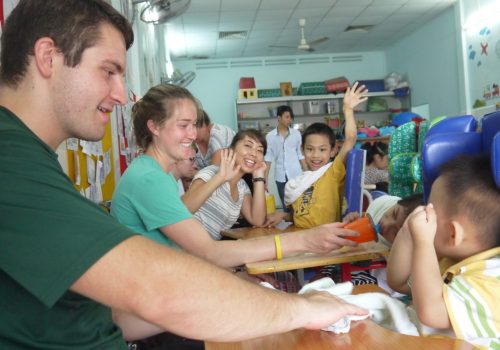 Participants feeding the children