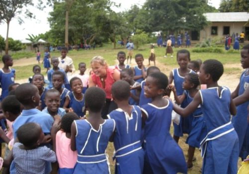 Partipant and students in the playground