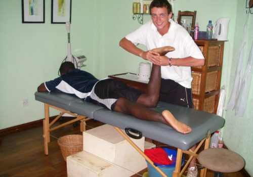 _Physiotheraphy_session_on_foot.JPG
